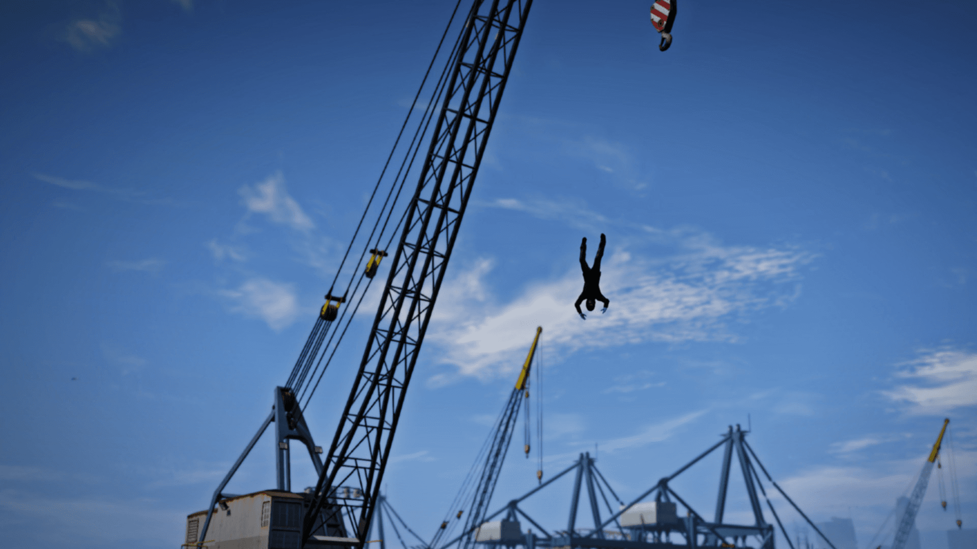 An in-game action scene with a character falling